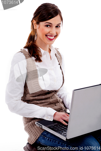Image of lady working on laptop