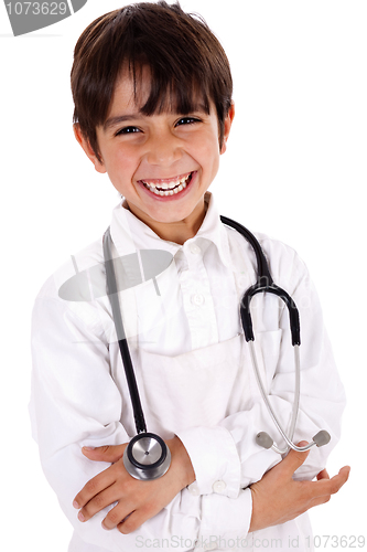 Image of Little cacasian boy wearing doctor coat