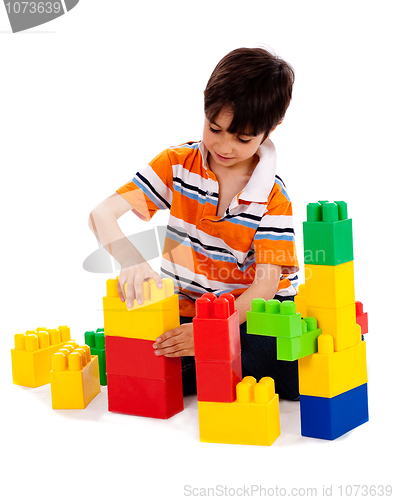 Image of Cute little boy playing