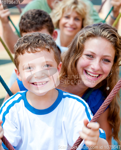 Image of Portrait of extended family enjoying