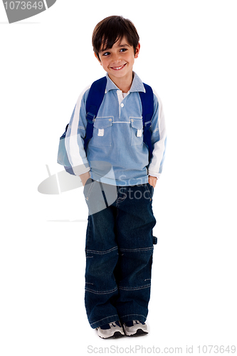 Image of Young school boy smiling and looking away