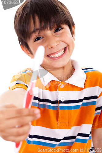 Image of Boy showing the toothbrush