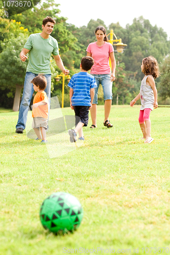 Image of Family spending their leisure time in the park