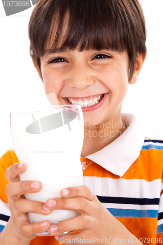 Image of Young kid with glass of milk