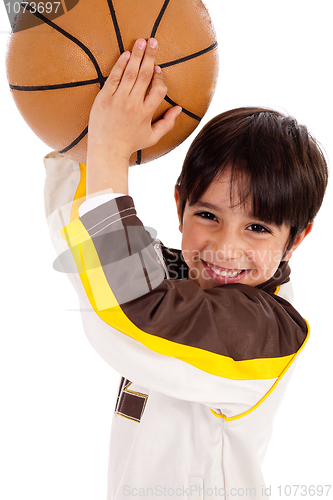Image of Portrait of a kid throwing ball at camera