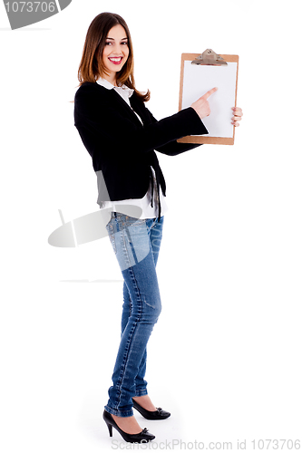 Image of Business woman pointing on a blank clip board