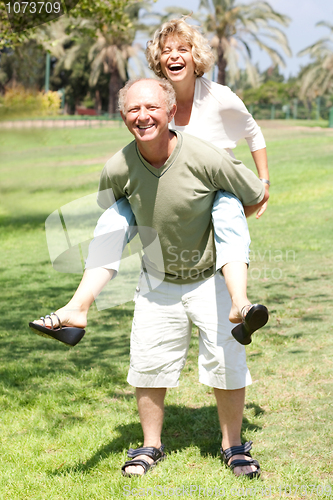 Image of Old lady enjoying piggyride