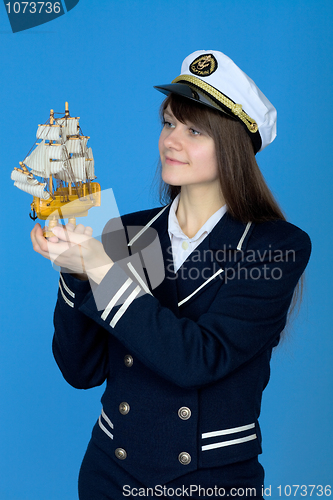 Image of Portrait of the woman in a sea cap with the ship