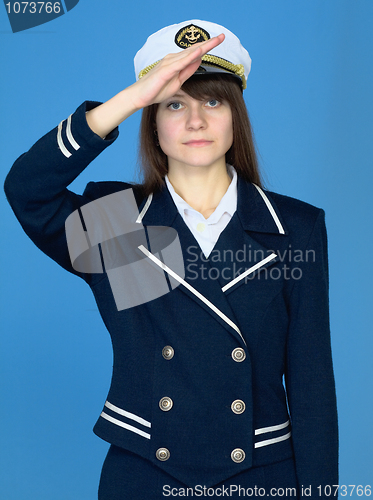 Image of Girl in a sea uniform salutes