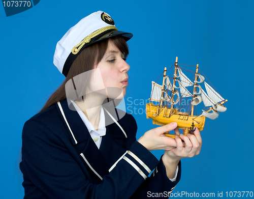 Image of Girl blowing on sails