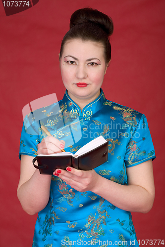 Image of Japanese girl with notebook