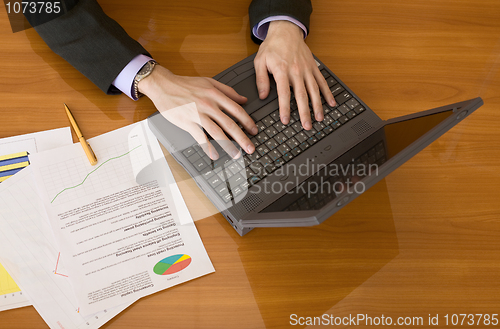 Image of Business people planning on the laptop