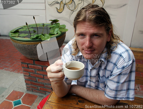 Image of Man drinking coffee