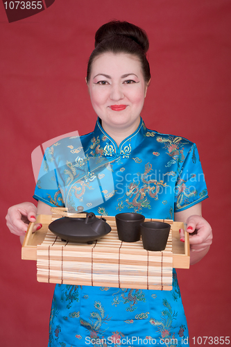 Image of Japanese girl with teapot