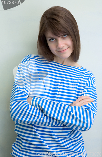 Image of Woman in a stripped vest