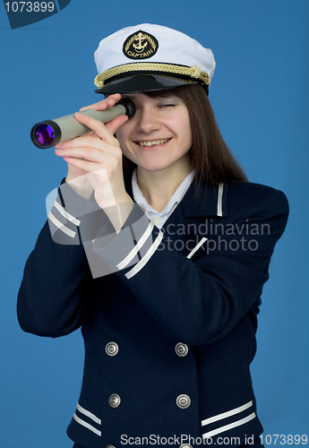 Image of Portrait of the girl - captain with telescope
