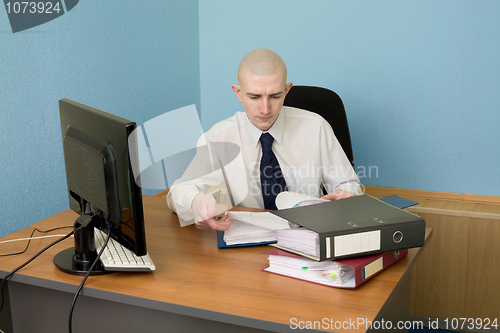 Image of Bookkeeper on a workplace at office