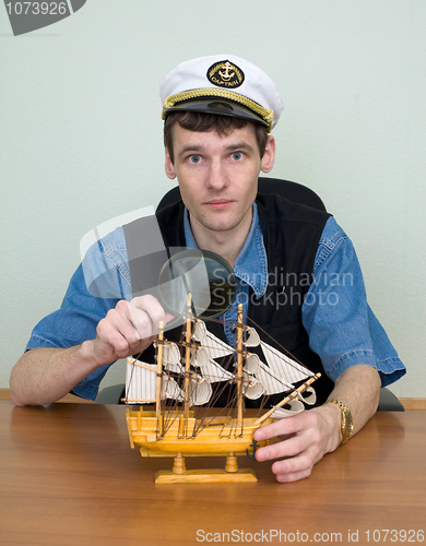 Image of Man in uniform cap with sailer