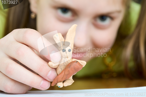 Image of Girl with a plasticine rabbit