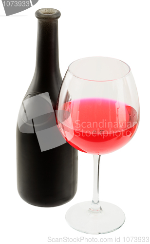 Image of Dark glasses wine bottle and goblet