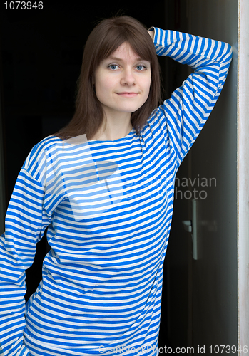 Image of Beautiful girl in a stripped vest