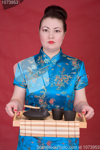 Image of Japanese girl with tea-tray