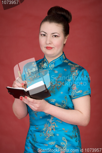 Image of Japanese girl with notebook