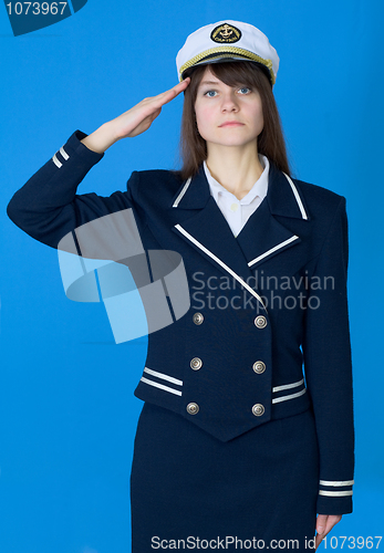 Image of Girl in a sea uniform salutes