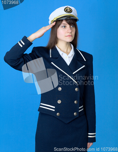 Image of Girl in a sea uniform salutes