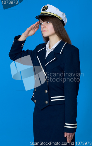 Image of Girl in a sea uniform salutes