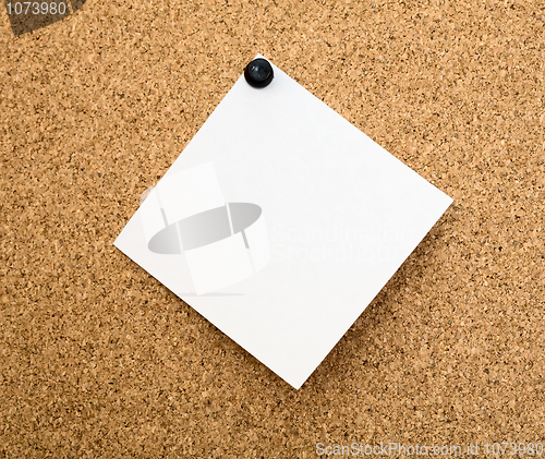 Image of Stickers pinned to a cork board