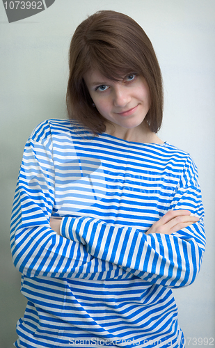 Image of Beautiful girl in a stripped vest