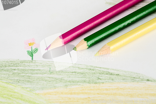Image of Children's drawing and pencils