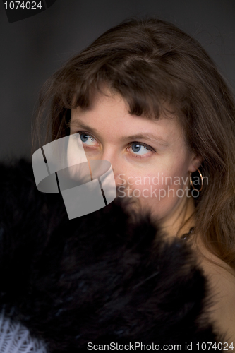 Image of Portrait of the girl with a fan