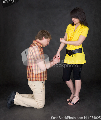 Image of Young woman to shake one's fist at youth