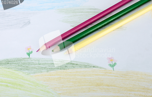 Image of Children's drawing and pencils