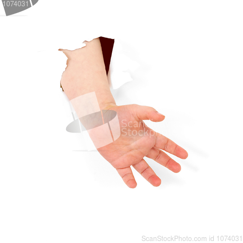 Image of Child's hand stick out from hole