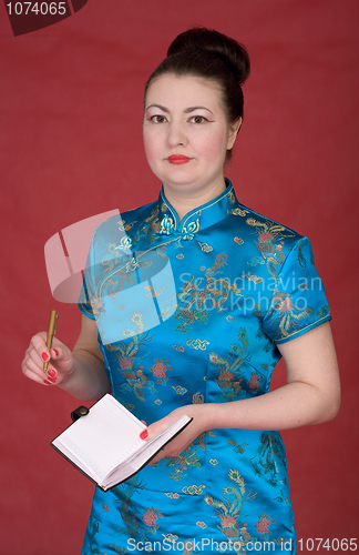 Image of Japanese girl with notebook