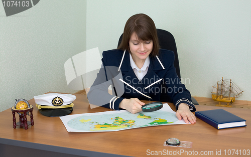 Image of Woman in uniform with geographic map
