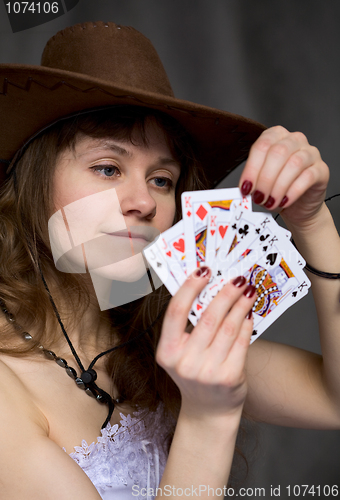 Image of Portrait girl with a playing-cards