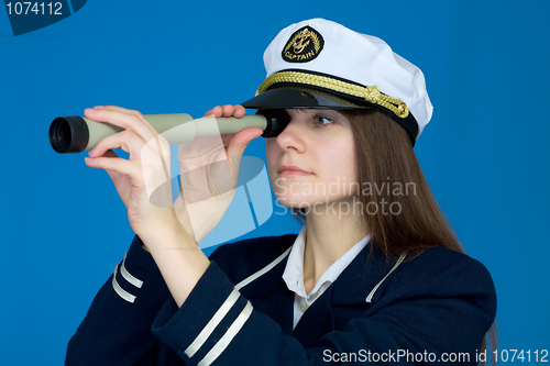 Image of Portrait of the girl - captain with telescope