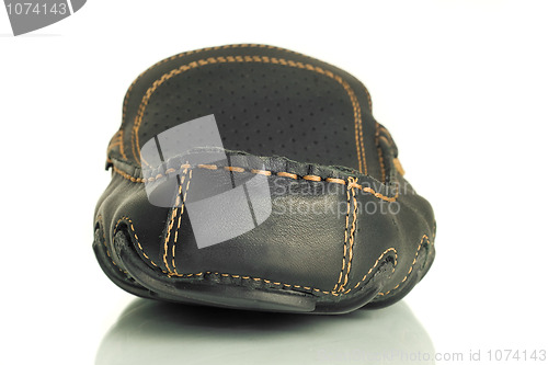 Image of Close-up of single black mens moccasin