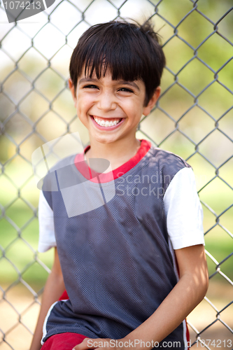 Image of Close up shot of a happy boy laughing