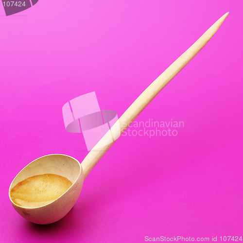 Image of wooden spoon with water