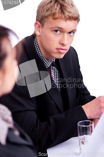 Image of Confident businessman looking at you