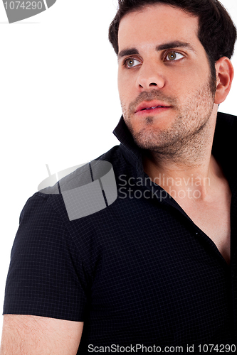 Image of macho young man looking away