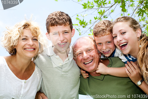 Image of Close-up shot of a happy family