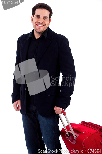 Image of young man carrying travel bag