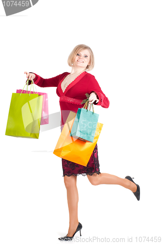 Image of Beautiful woman with shopping bags