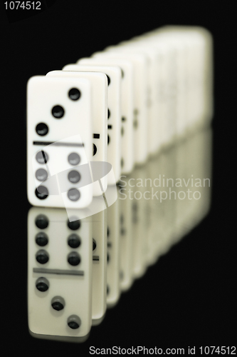 Image of Bones of dominoes on a black background